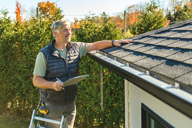 Professional Hail Damage Roof Repair technician working in Bushkill, PA